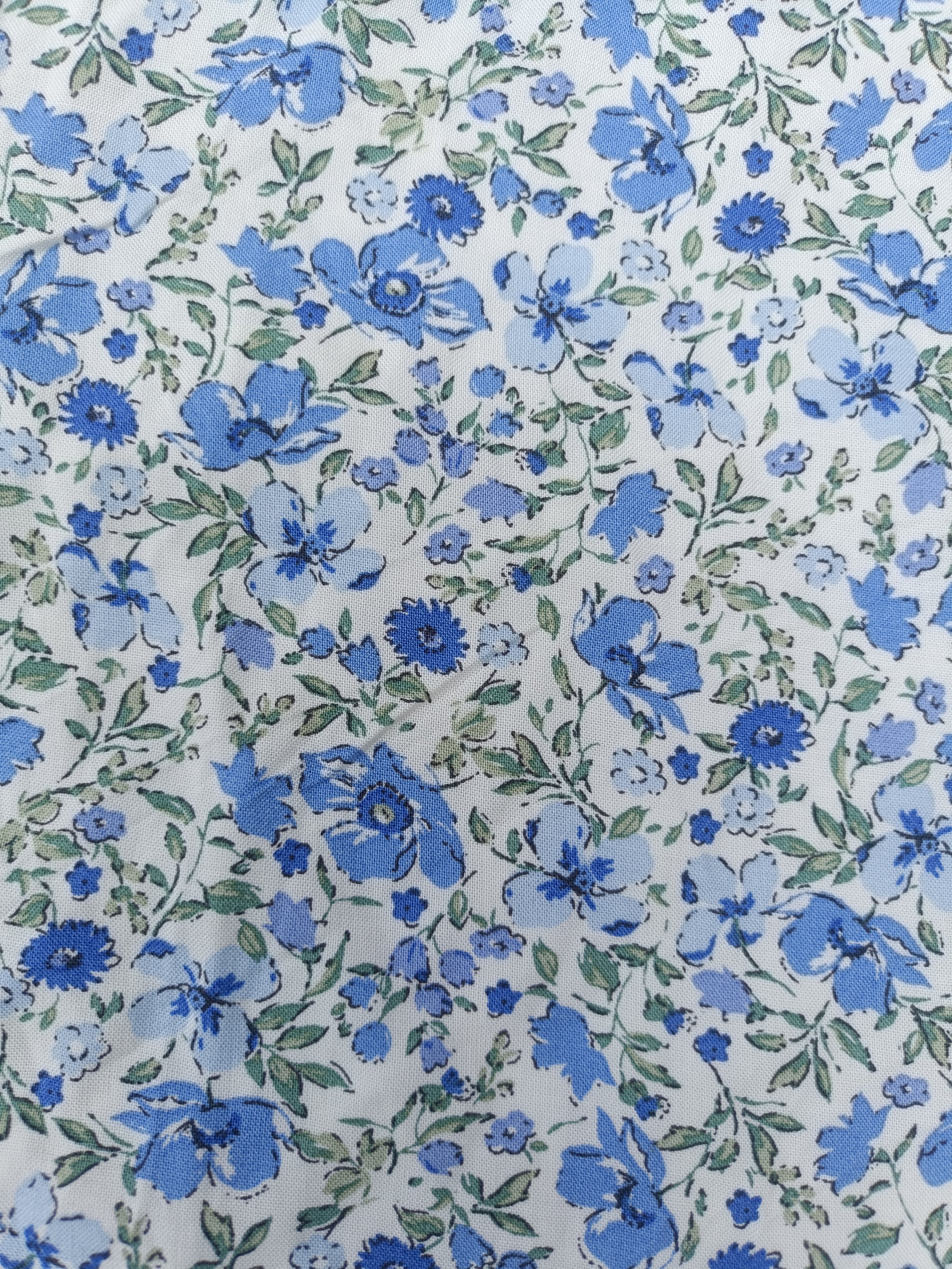 Women's Off-White with Blue Floral Print Flared Umbrella model kurti with Elbow Sleeves