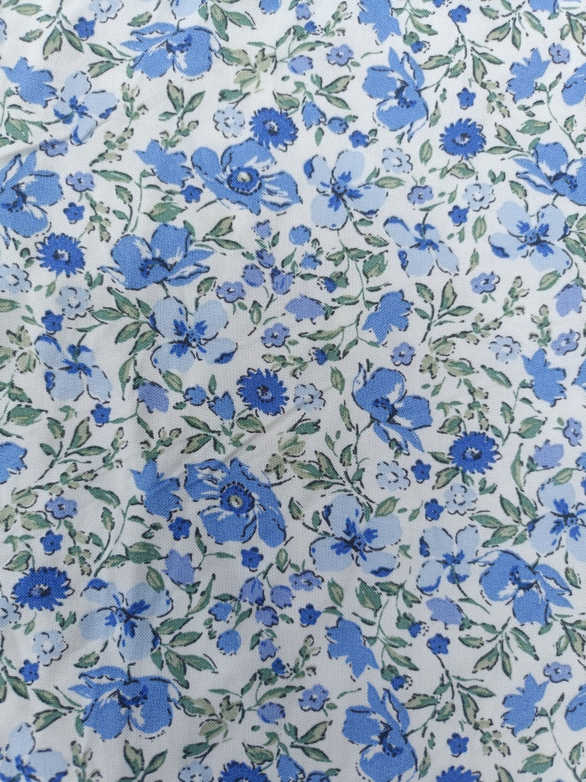 Women's Off-White with Blue Floral Print Flared Umbrella model kurti with Elbow Sleeves