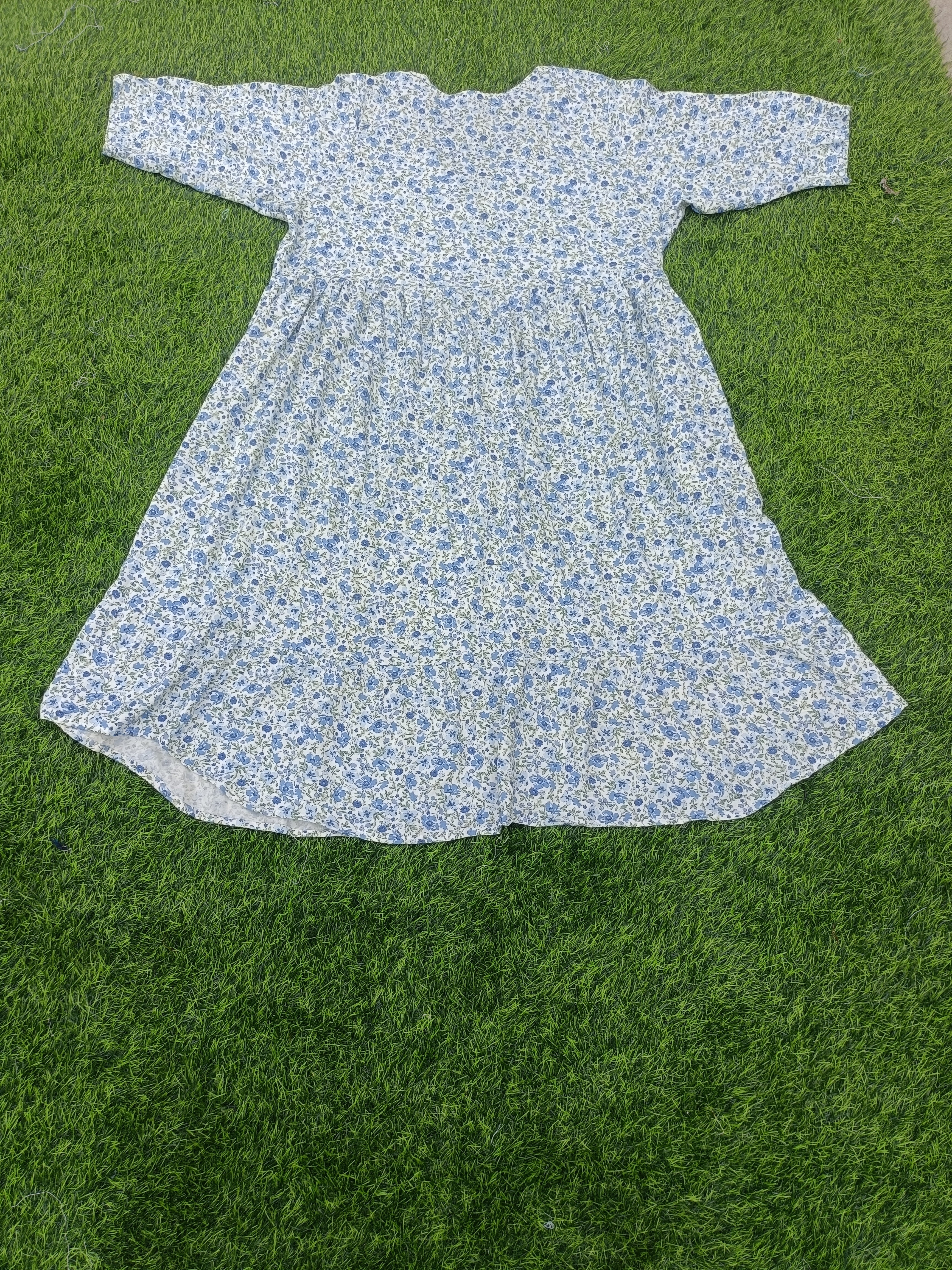 Women's Off-White with Blue Floral Print Flared Umbrella model kurti with Elbow Sleeves