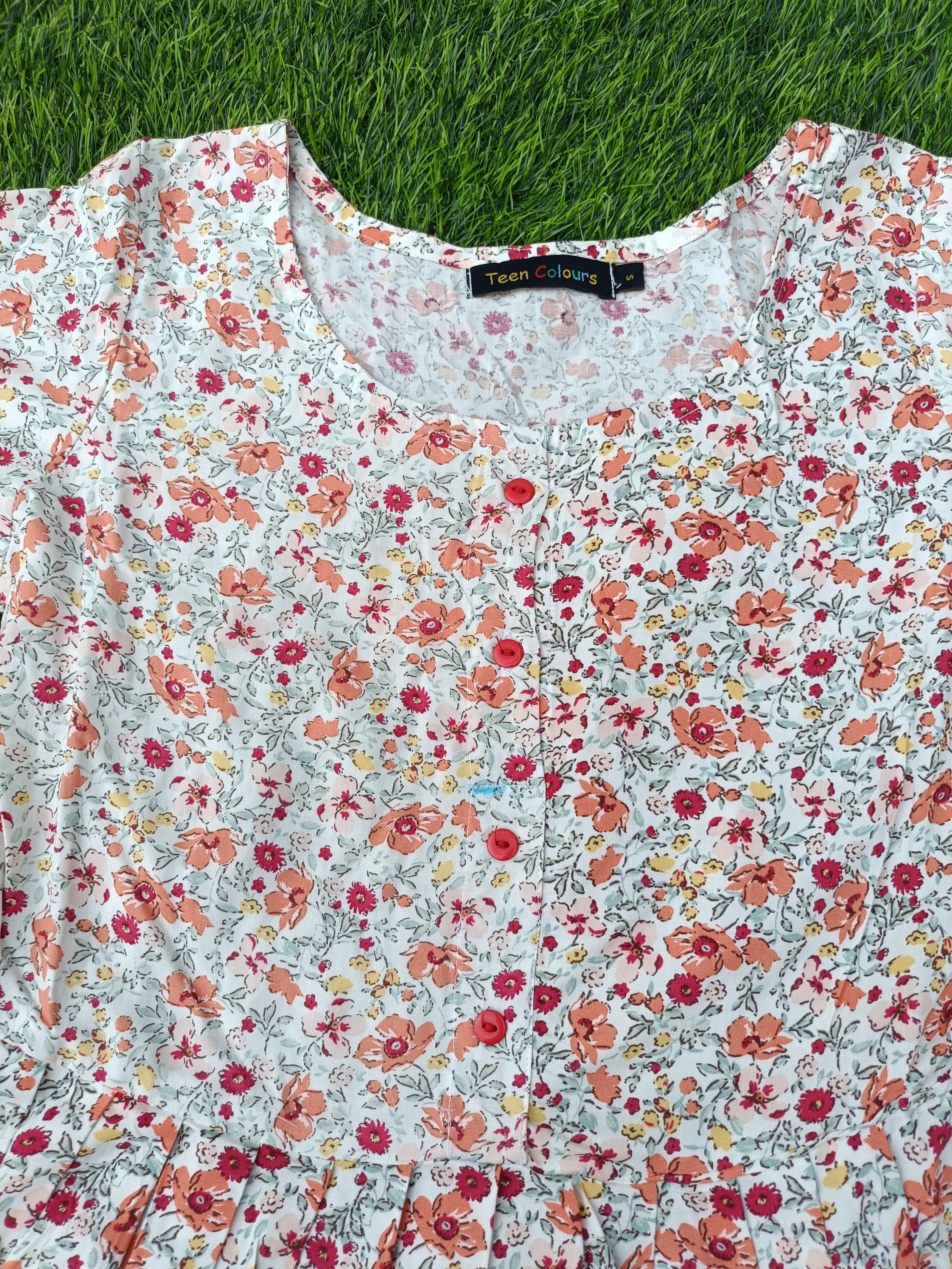 Women'sOff-White with Orange and Pink Floral Print Flared Umbrella model kurti with Elbow Sleeves