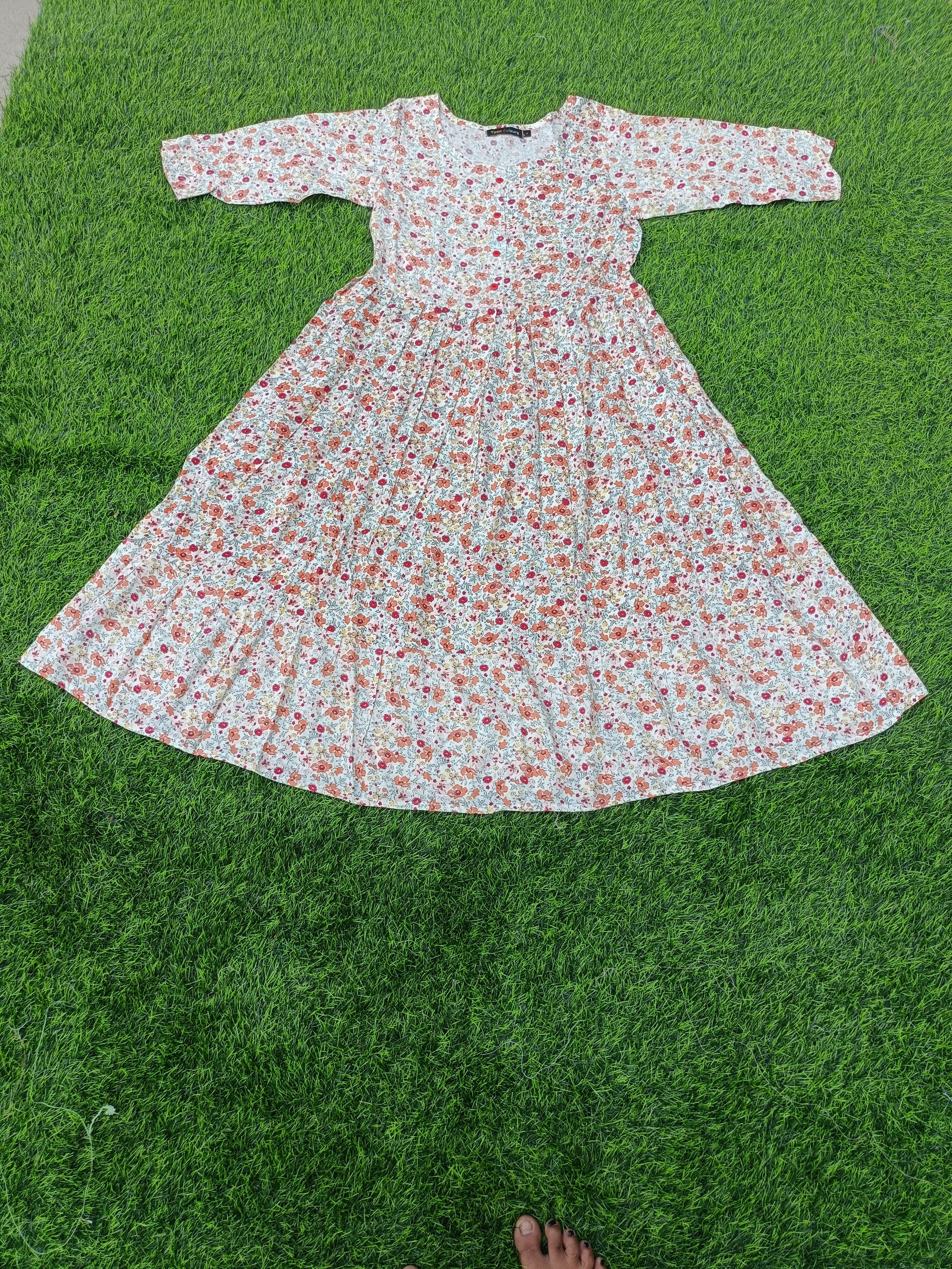 Women'sOff-White with Orange and Pink Floral Print Flared Umbrella model kurti with Elbow Sleeves