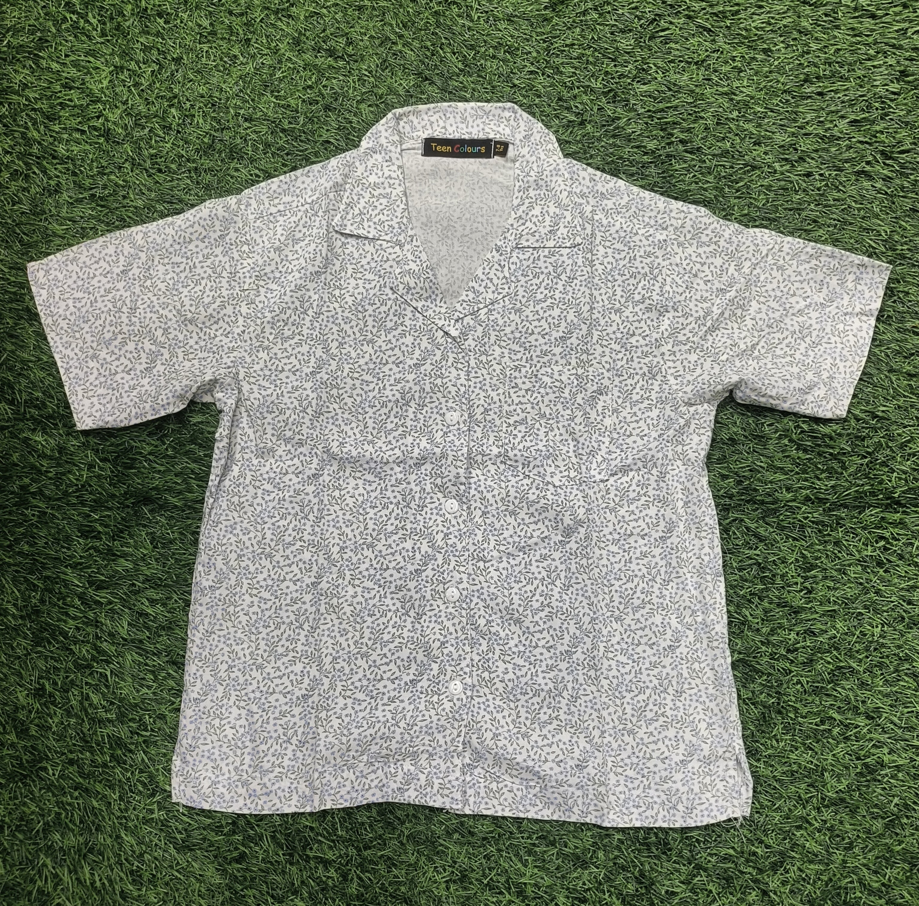 Teen Colours Kids White base decorated with an all-over ditsy floral print Cuban Collar rayon Baggy Shirt
