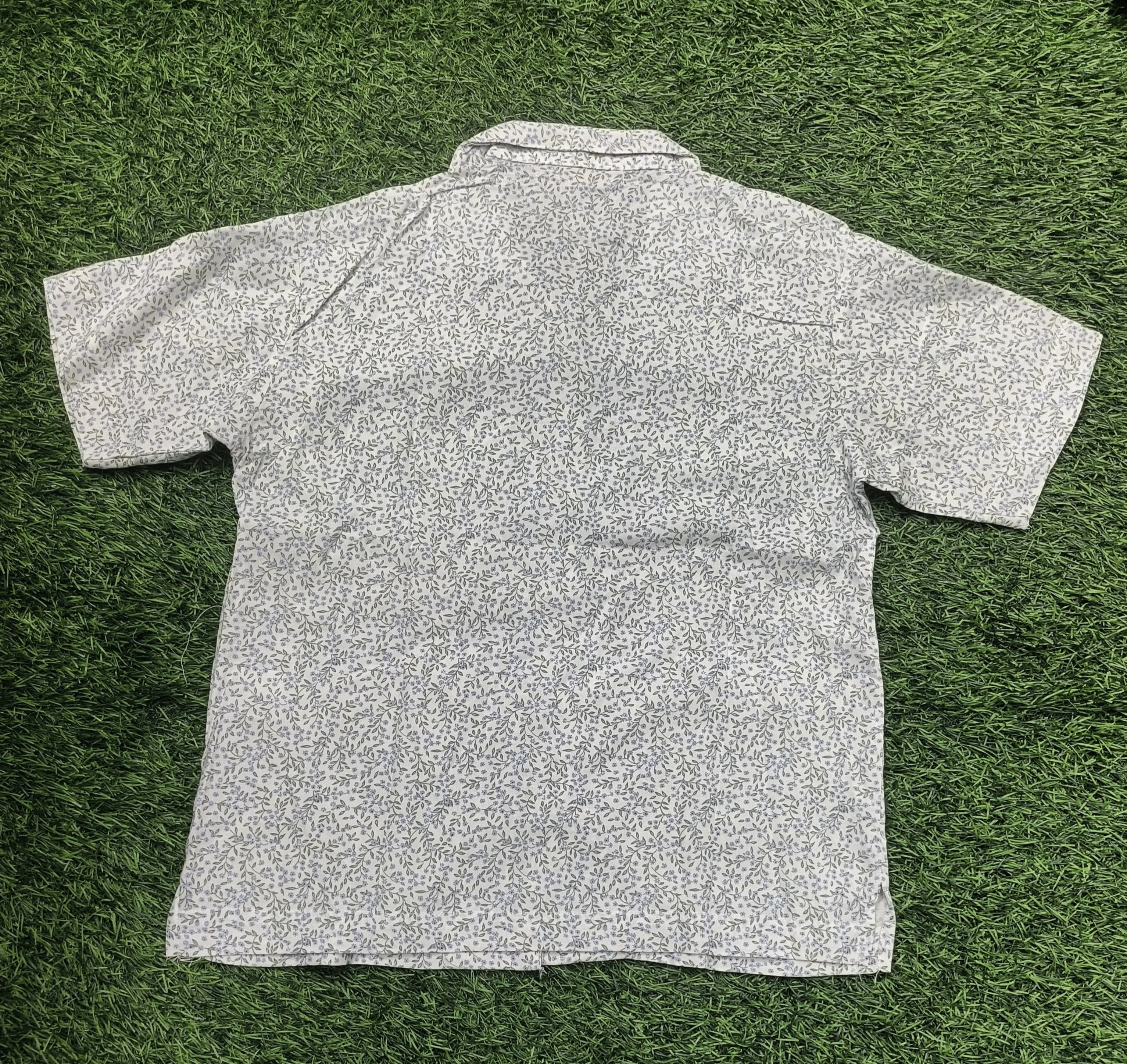 Teen Colours Kids White base decorated with an all-over ditsy floral print Cuban Collar rayon Baggy Shirt