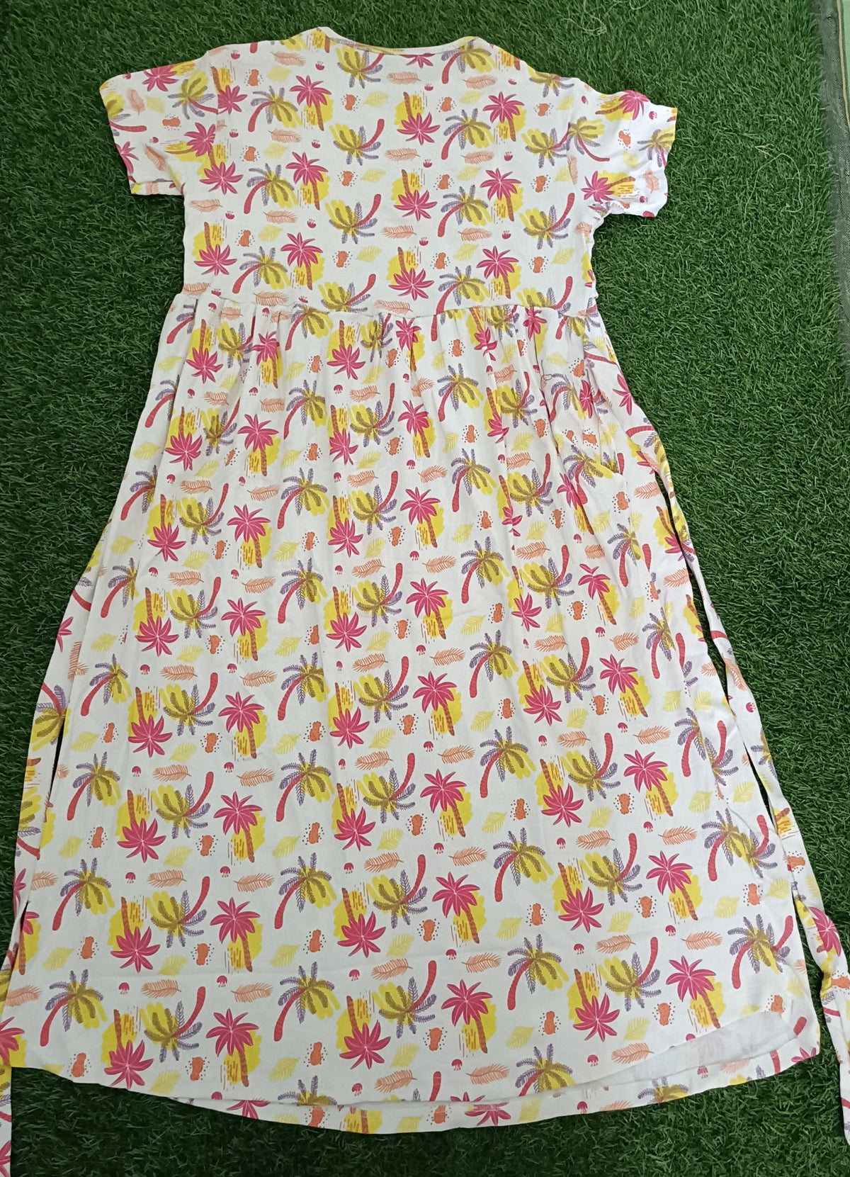 Ladie's Knitted Fabric White Multicolour Tropical Print Feeding Kurti with Gathered Waist & Side Tie-Up