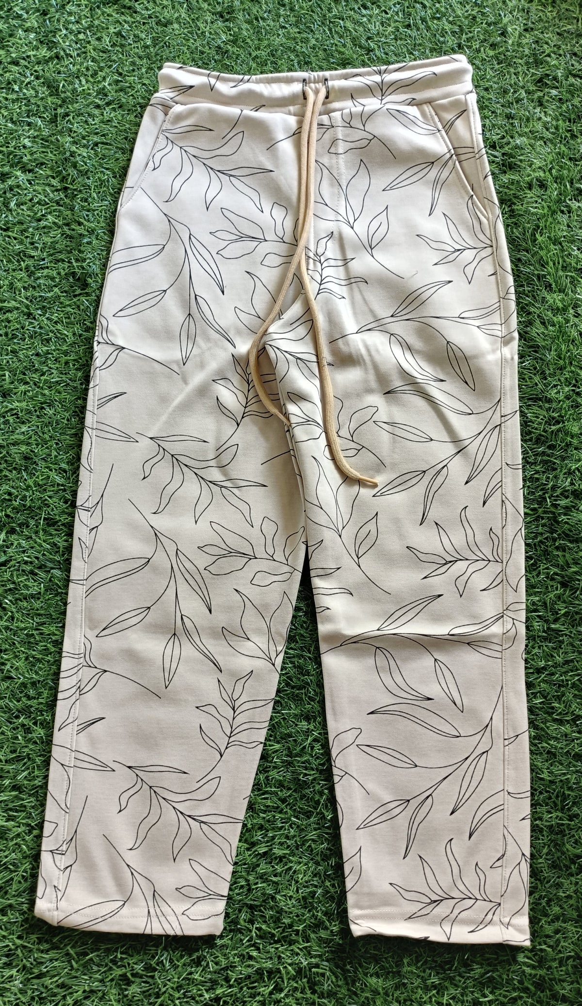 Boys Beige Leaf Print Hosiery Track Pant