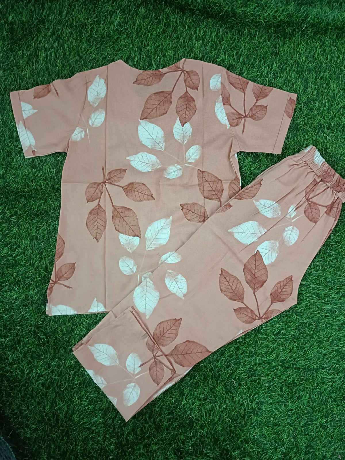 Women's Premium Alfain Fabric Dusty Peach Leaf Print Round Neck Night Suit with Side Slit Top & Elastic Waist Straight Pant