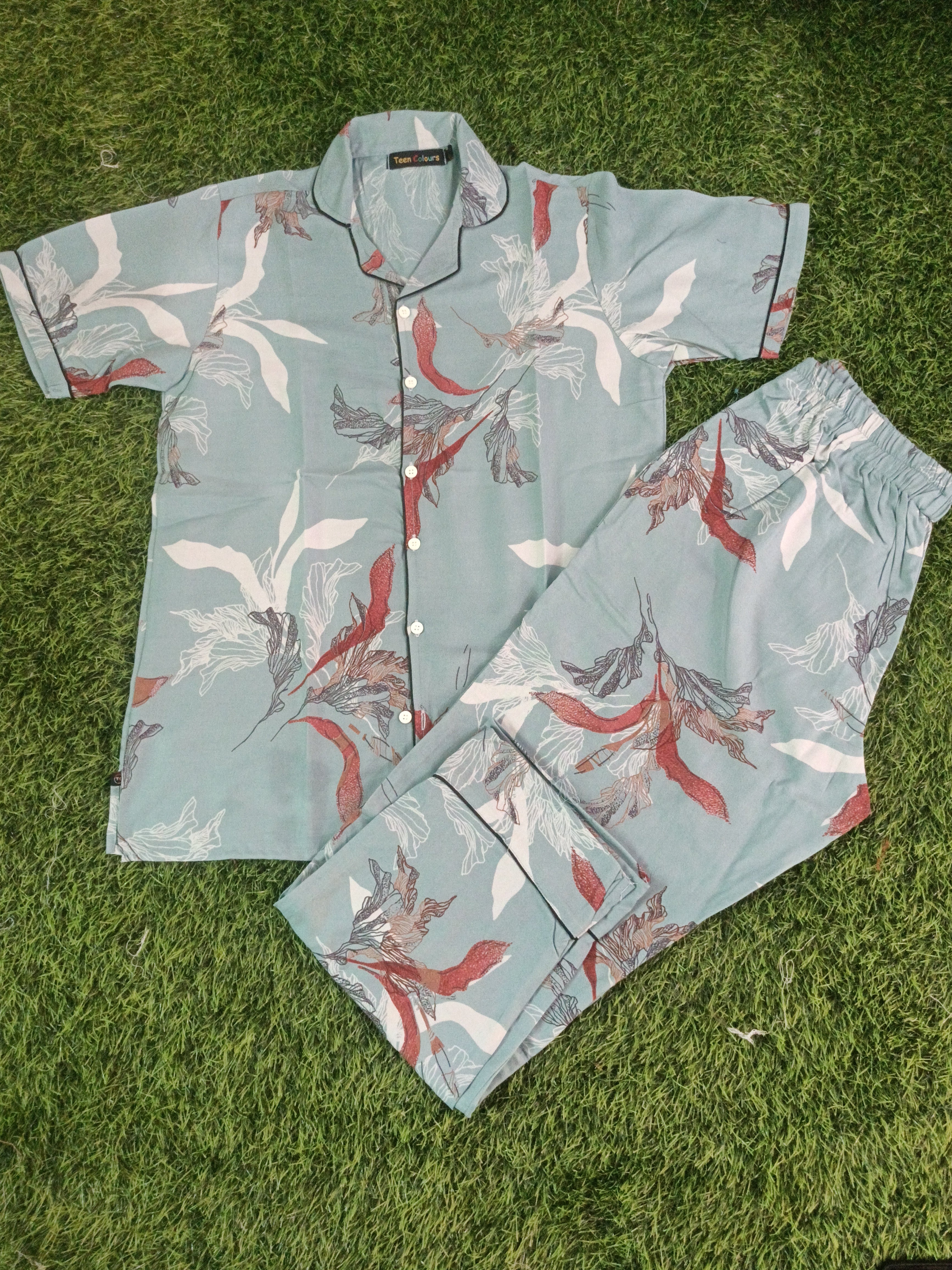 Premium Alfain Aqua Botanical Co-ord Set, 
With Button-down front, notch collar, contrast black piping, elasticated waist.