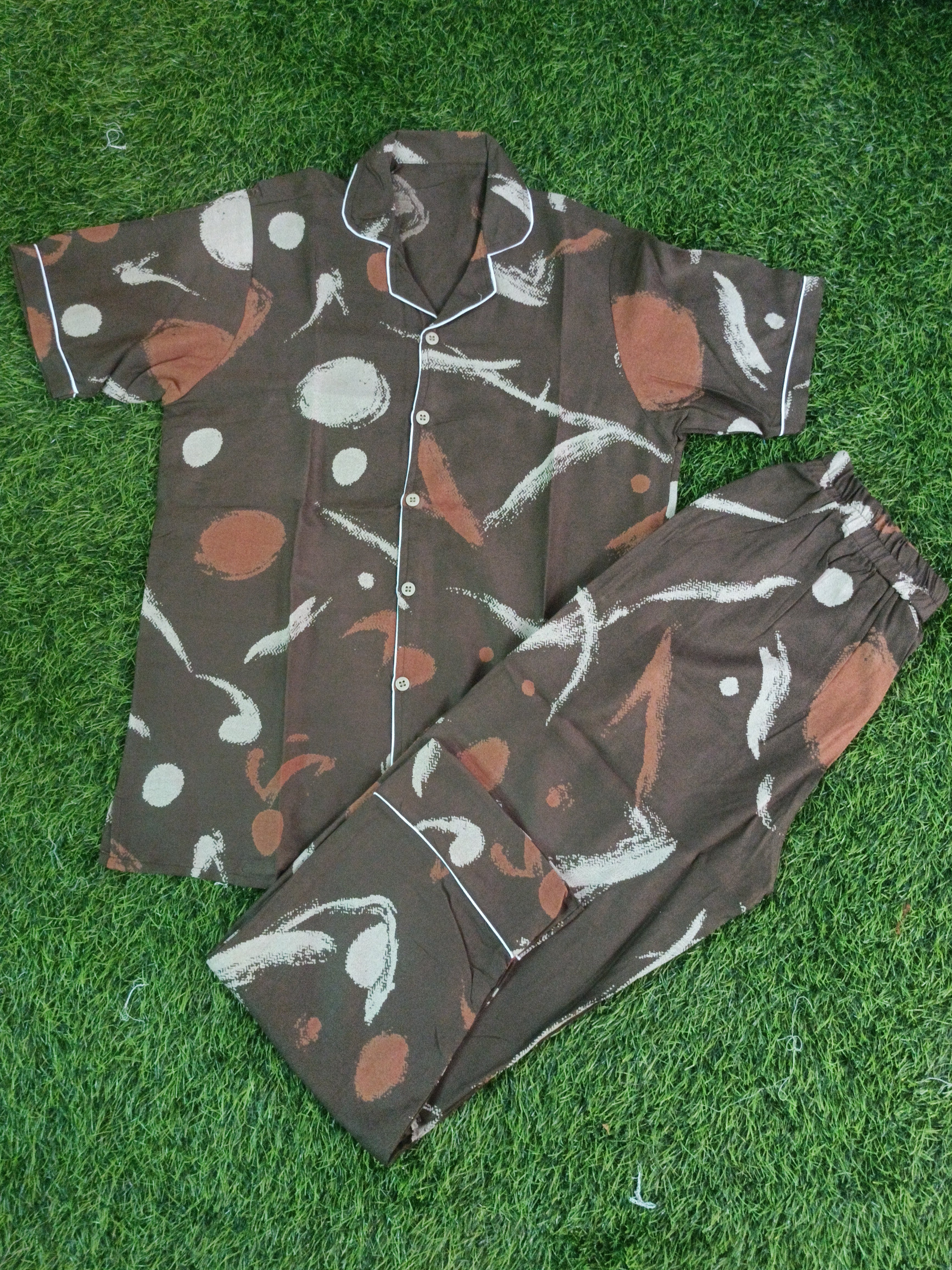 Premium Alfain Chocolate Brown Abstract Co-ord Set,With Button-down front, notch collar, contrast black piping, elasticated waist.