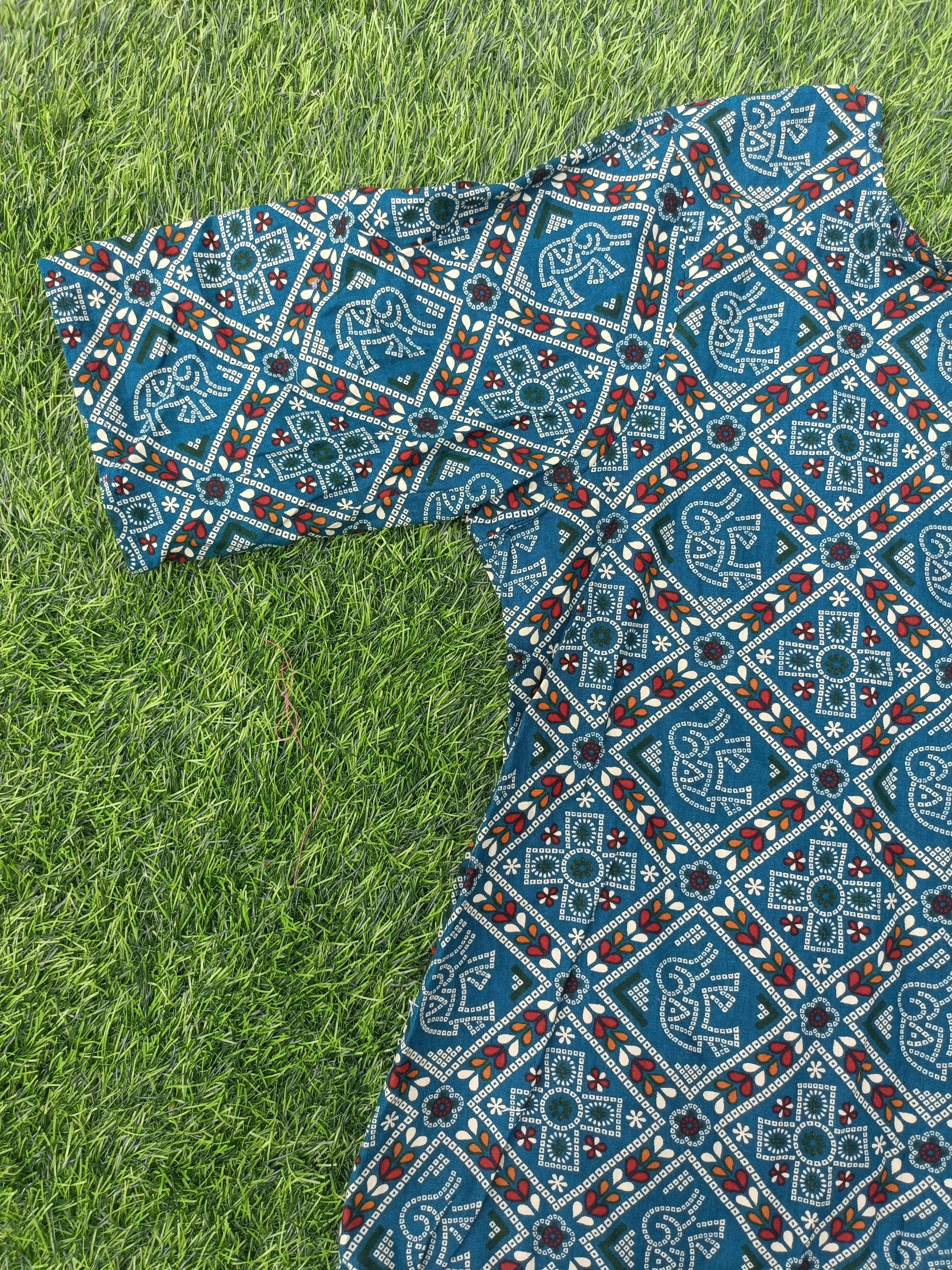 Women’s Peacock Blue Multicolour Ethnic Printed Cotton Straight-Cut Kurthi with Elbow Sleeves & Pocket