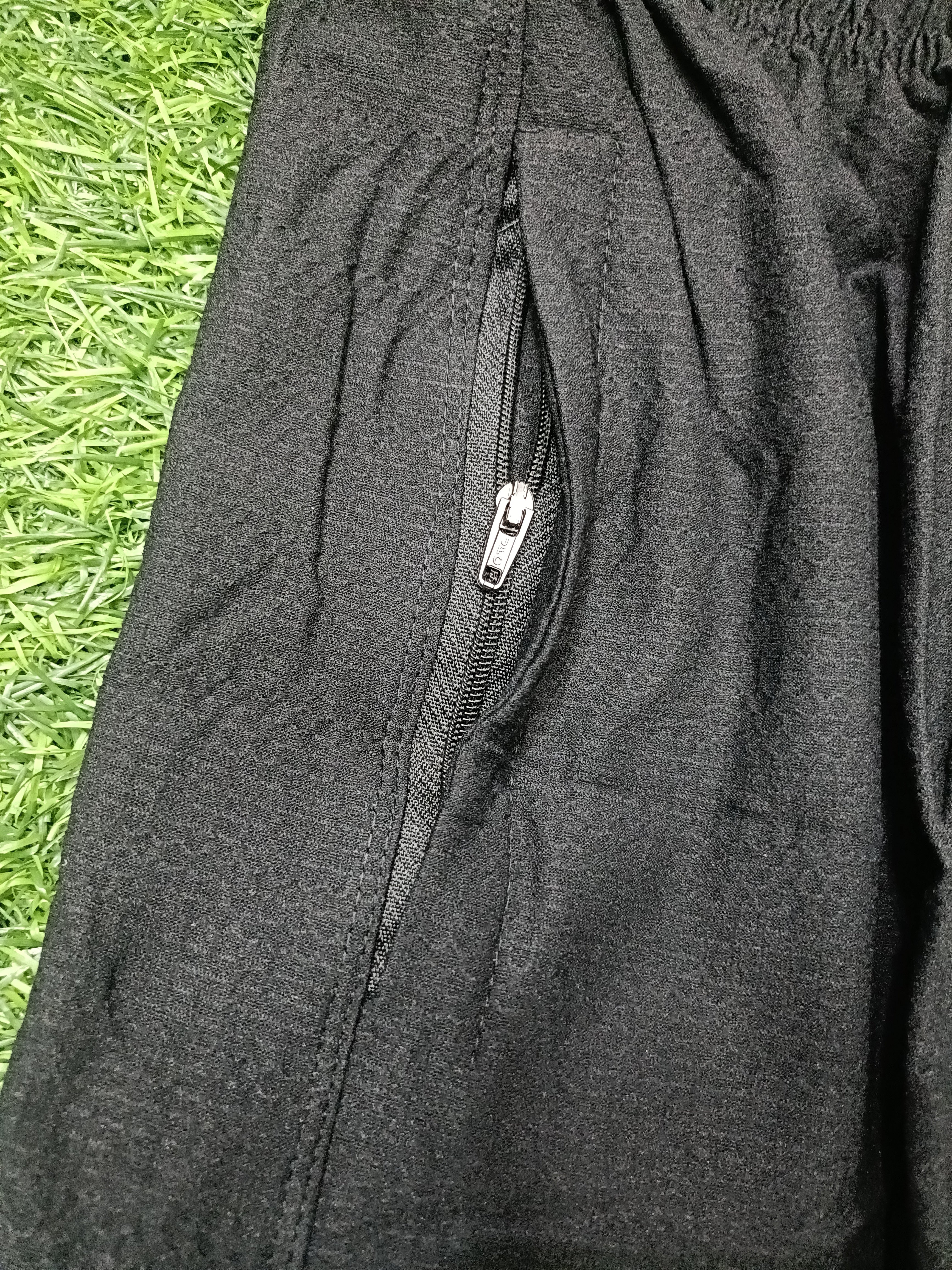 Men’s Black color Textured Sports Shorts with Elastic Waist & Zipper Pockets