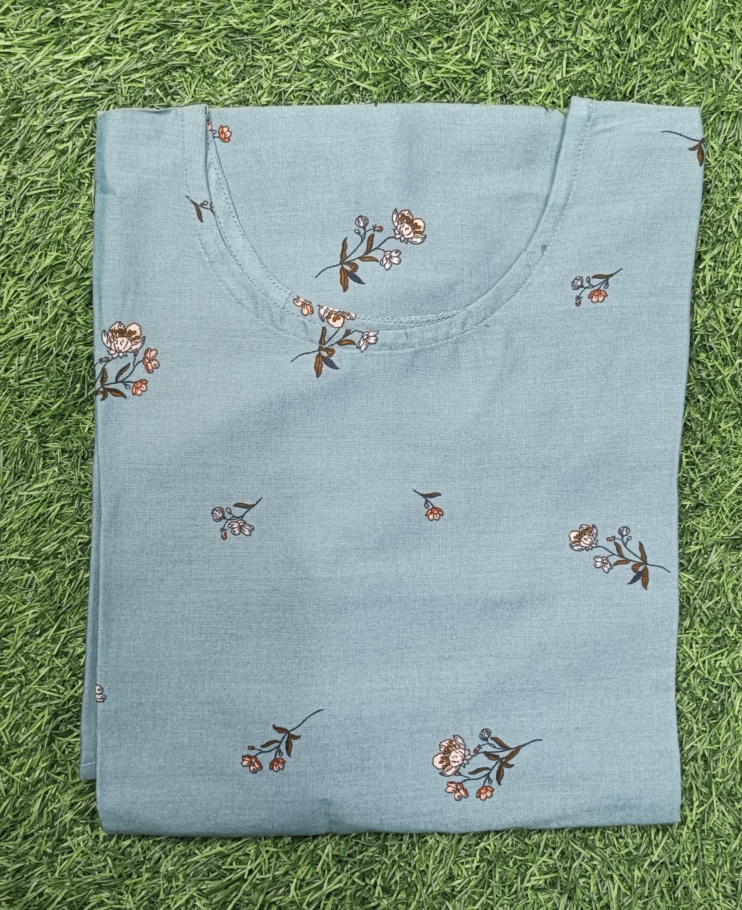 Womens Teal Blue color Cotton Kurti - White and Peach Small Floral Print, Round Neck, Elbow Sleeves, Straight Cut with Pocket