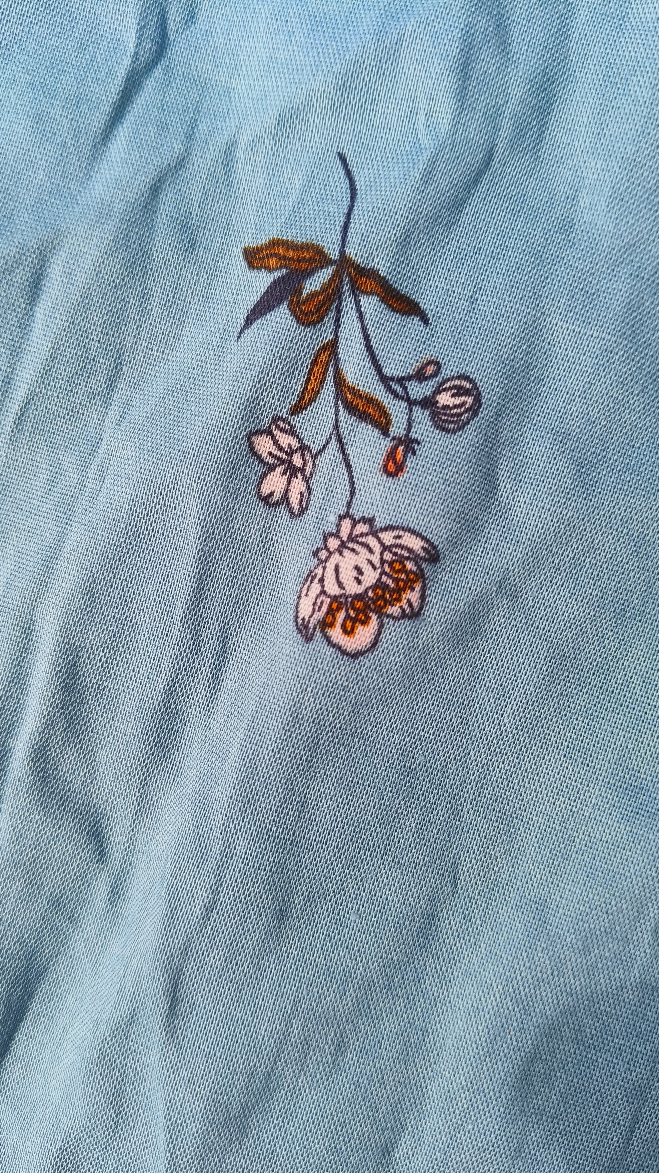 Womens Teal Blue color Cotton Kurti - White and Peach Small Floral Print, Round Neck, Elbow Sleeves, Straight Cut with Pocket