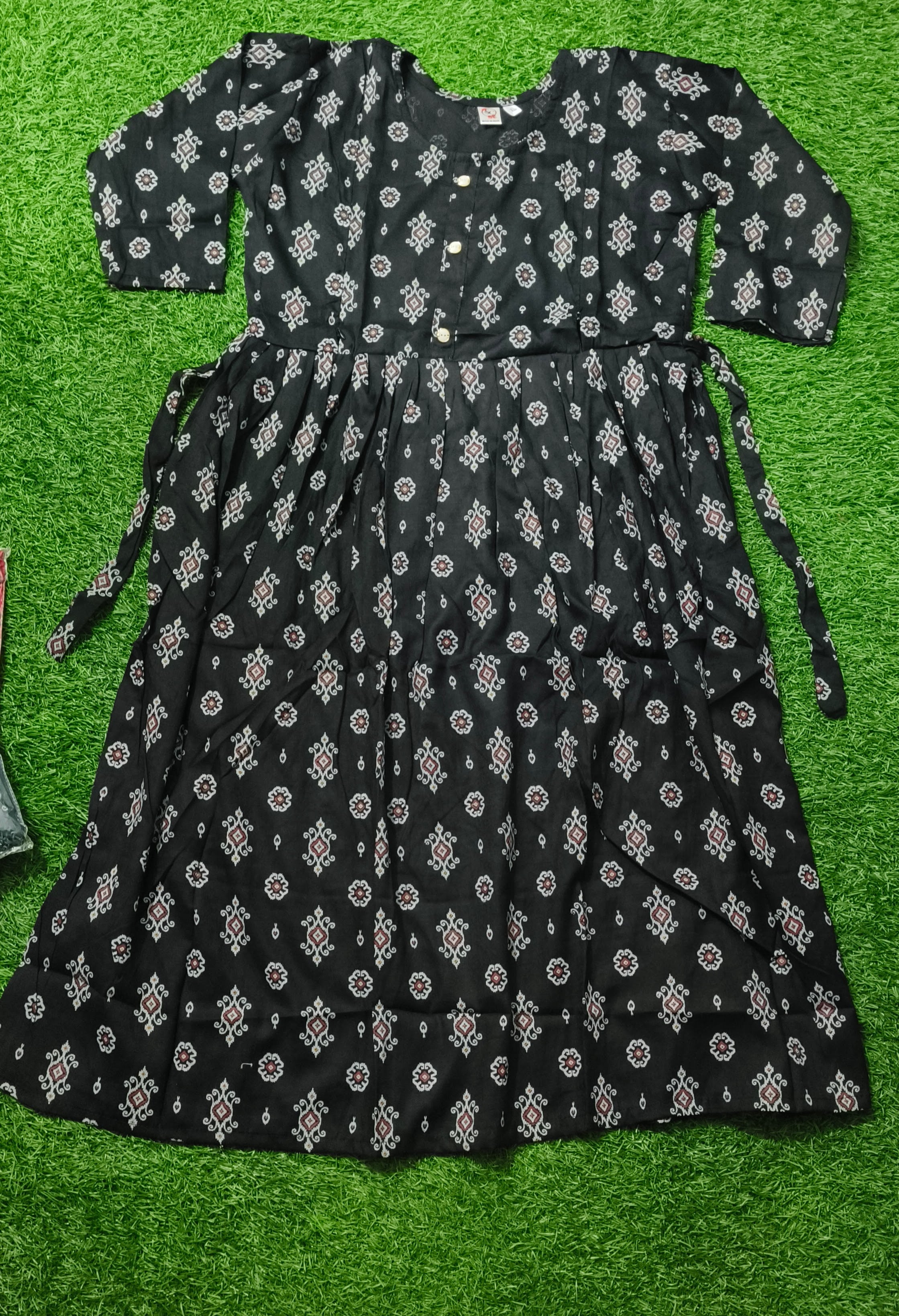 Elegant black Printed Single Piece Kurti with Front Buttons and Waist Tie