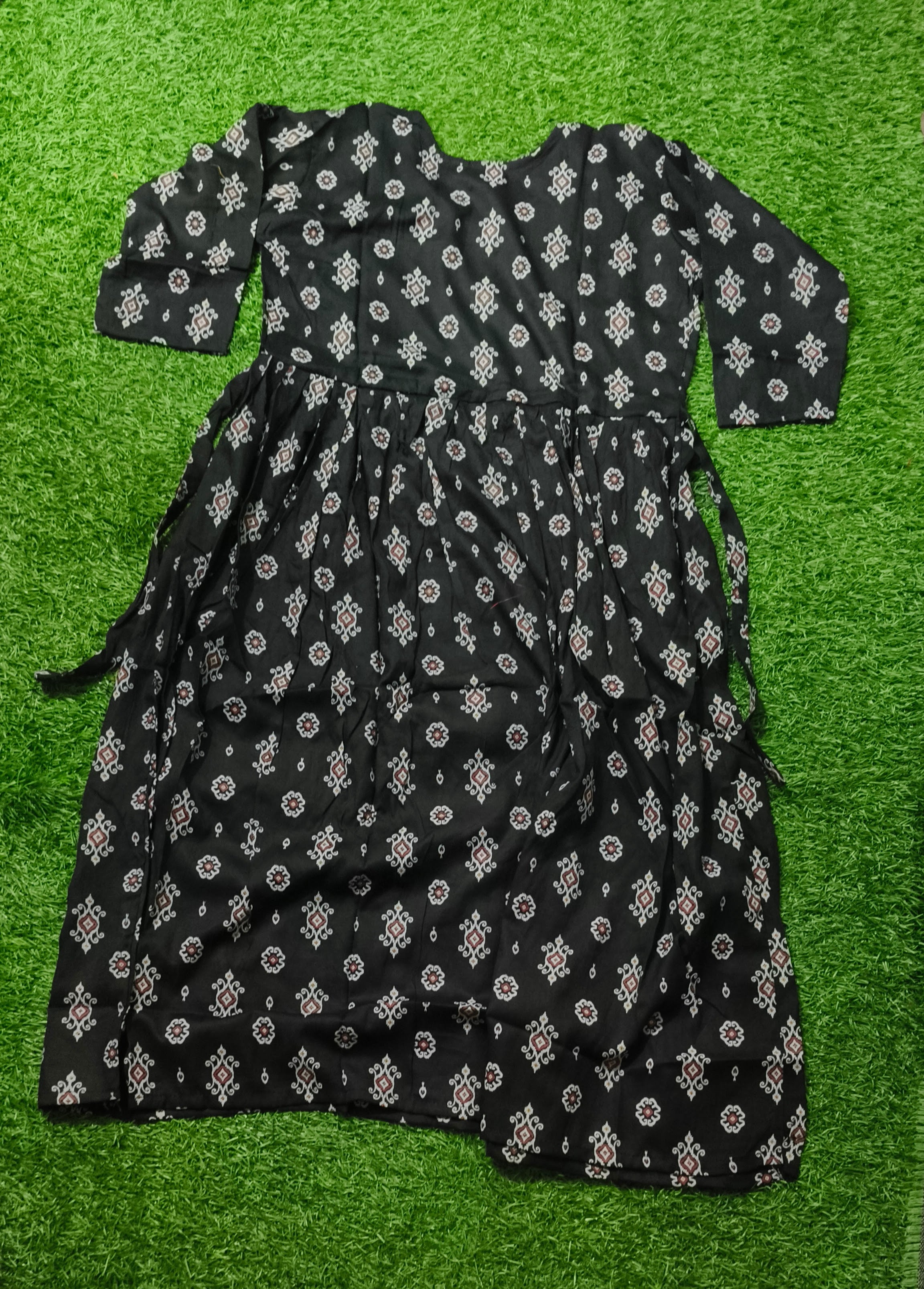 Elegant black Printed Single Piece Kurti with Front Buttons and Waist Tie