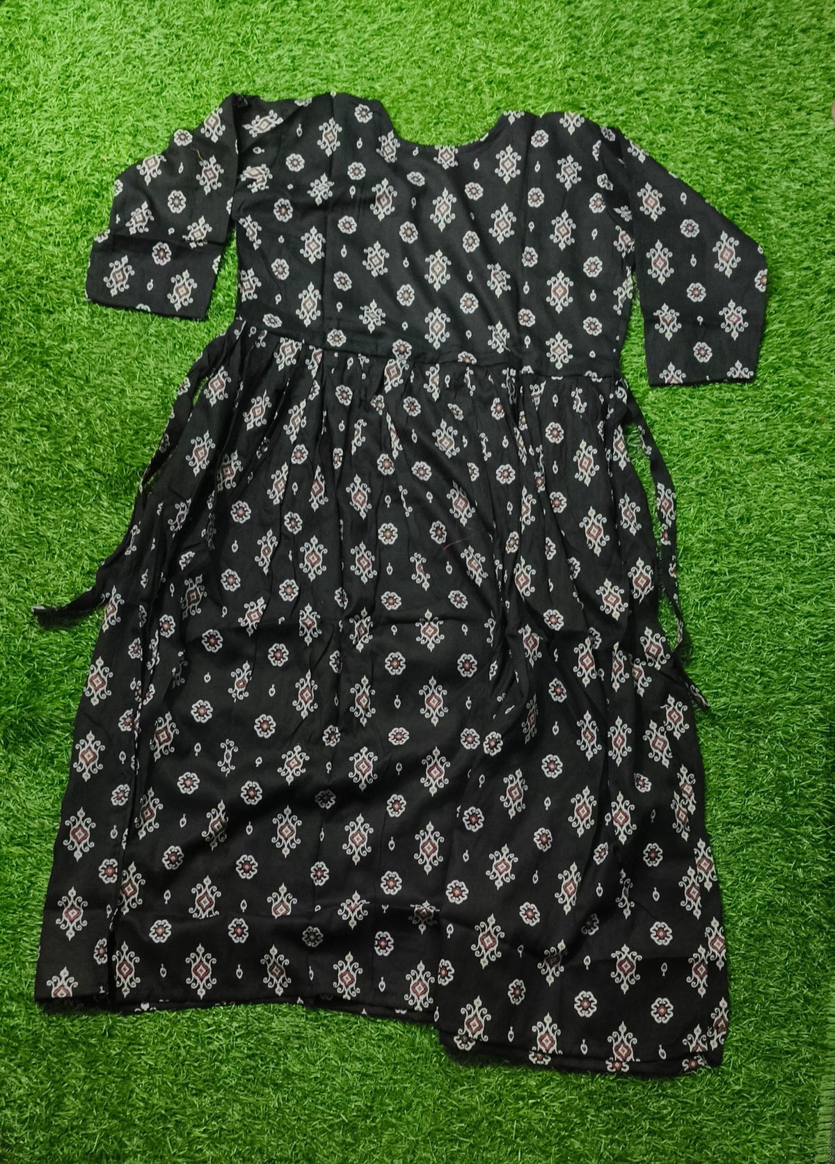 Elegant black Printed Single Piece Kurti with Front Buttons and Waist Tie