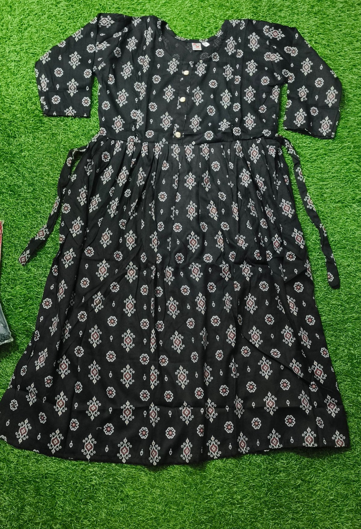 Elegant black Printed Single Piece Kurti with Front Buttons and Waist Tie