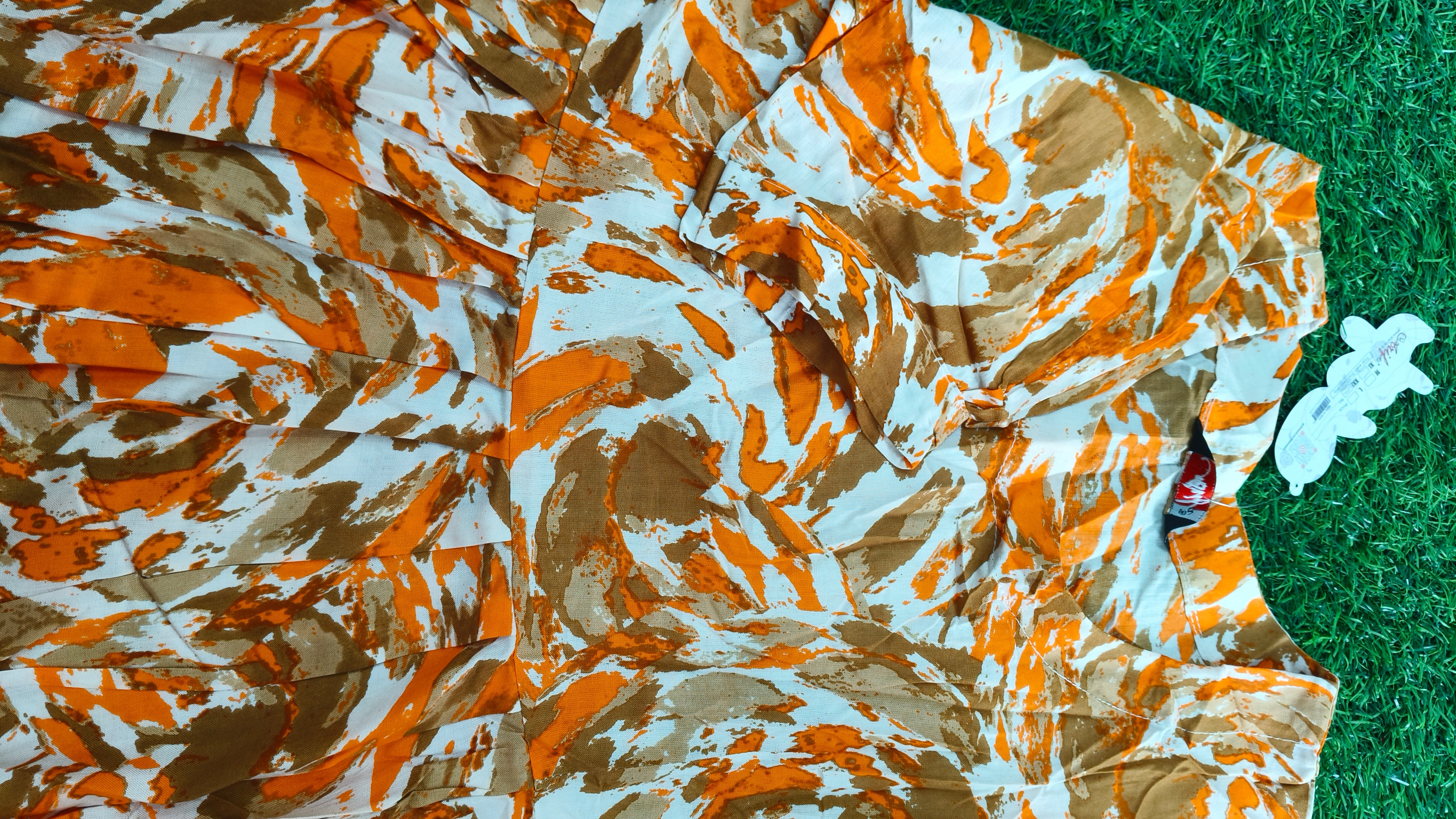 Vibrant Orange, Brown, and Off-White Abstract Print Cotton Single Piece Kurti