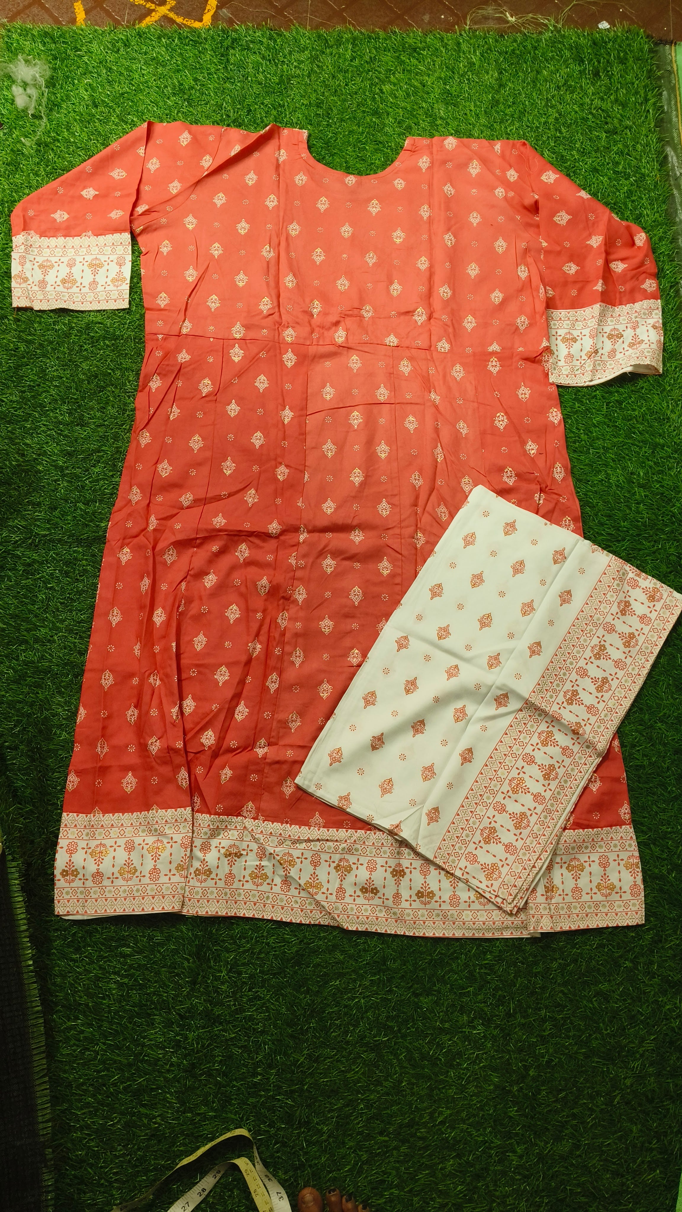 Elegant Dusty Pink Embroidered Single Piece Tiered Kurti