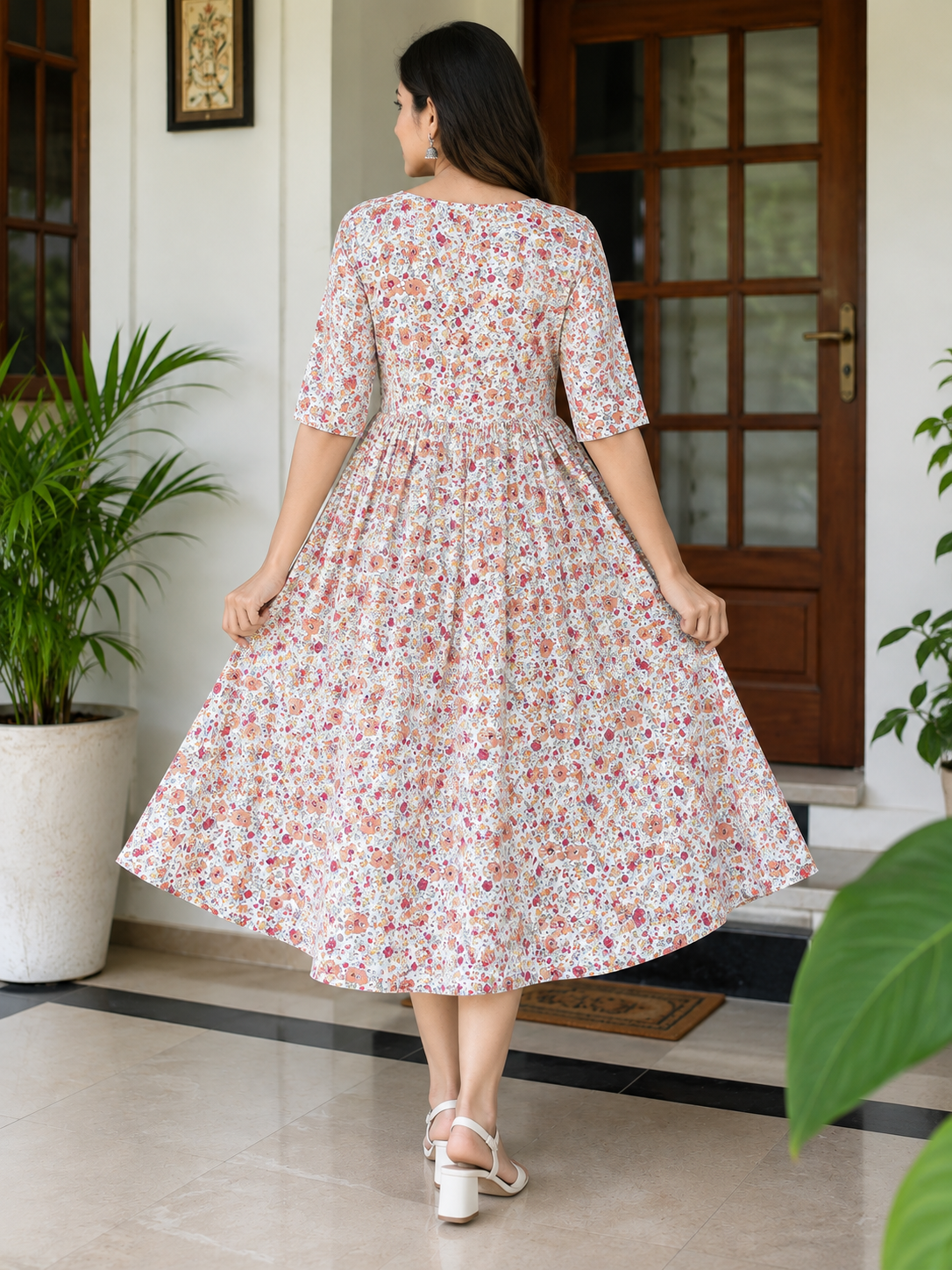 Women's Off-White with Orange and Pink Floral Print Flared Umbrella model kurti with Elbow Sleeves